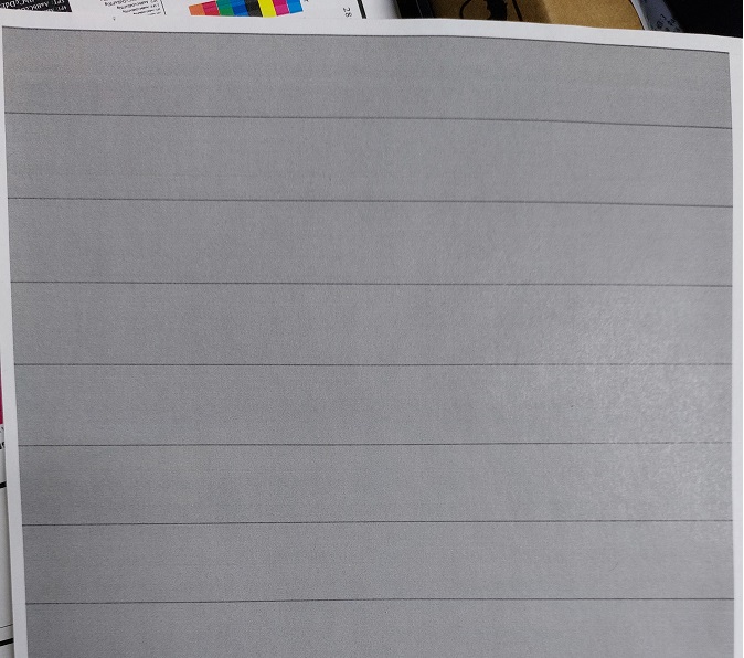 черные полосы на сером фоне после простоя цветного лазерного принтера
